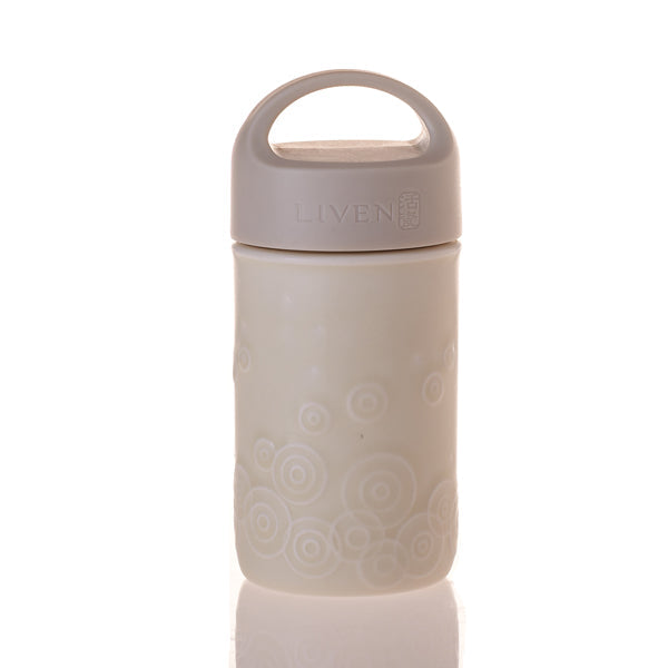 Silicone container with handle on a white background