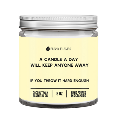 A Candle A Day scented candle with sea salt, jasmine, and tonka bean in a 9oz glass jar, humorous warning label