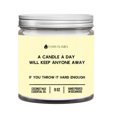 A Candle A Day scented candle with sea salt, jasmine, and tonka bean in a 9oz glass jar, humorous warning label