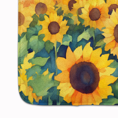 Close-up of Kansas Sunflowers watercolor memory foam kitchen mat with bright yellow sunflowers and green leaves design