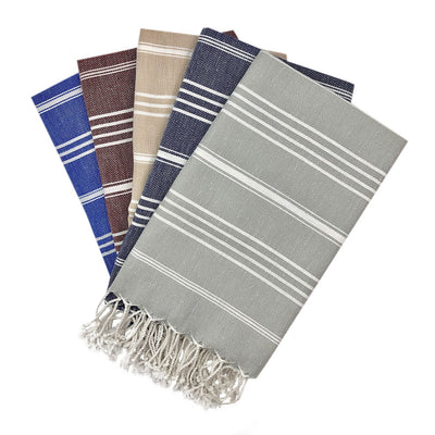 Classic Turkish hand towels in assorted colors with hand-knotted fringe edges, made of 100% Turkish cotton